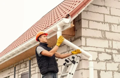 Pose et remplacement de gouttières aux Villages Vovéens